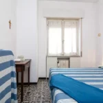 163_1230_camera_da_letto_con_letto_singolo_pieghevole_Borghetto_Santo_Spirito