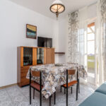 178_1205_zona_giorno_con_porta_finestra_per_accedere_al_terrazzo_Borghetto_Santo_Spirito