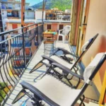 183_1265_balcone_con_vista_aperte_e_tende_da_sole_Borghetto_Santo_Spirito