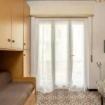 188_1403_CAMERAV_DA_LETTO_CON_PORTA_FINESTRA_Borghetto_Santo_Spirito
