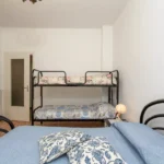 218_2110_camera_da_letto_con_matrimoniale_e_letto_a_castello_Borghetto_Santo_Spirito