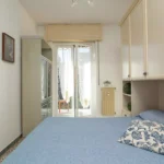 226_2966_camera_da_letto_con_porta_finestra_Borghetto_Santo_Spirito